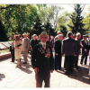 Колонна ветеранов ВОВ идут для возложения цветов к Памятникам в парке, в первом ряду Лях В.В. и Кузьменков несут корзину цветов, 9 мая, 1995 год.